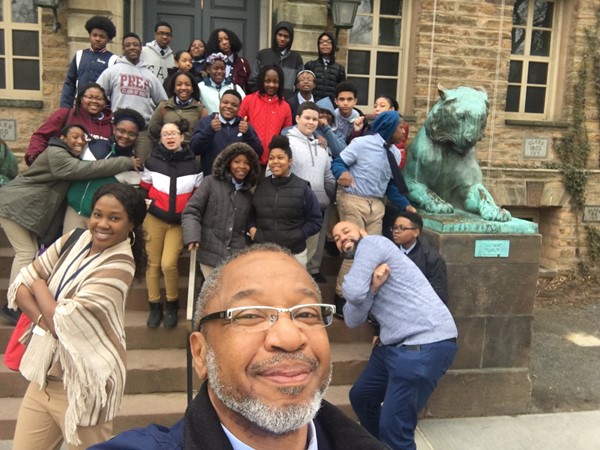 Mr. Depeine takes a selfie with DLEACS students at his alma mater, Princeton University.